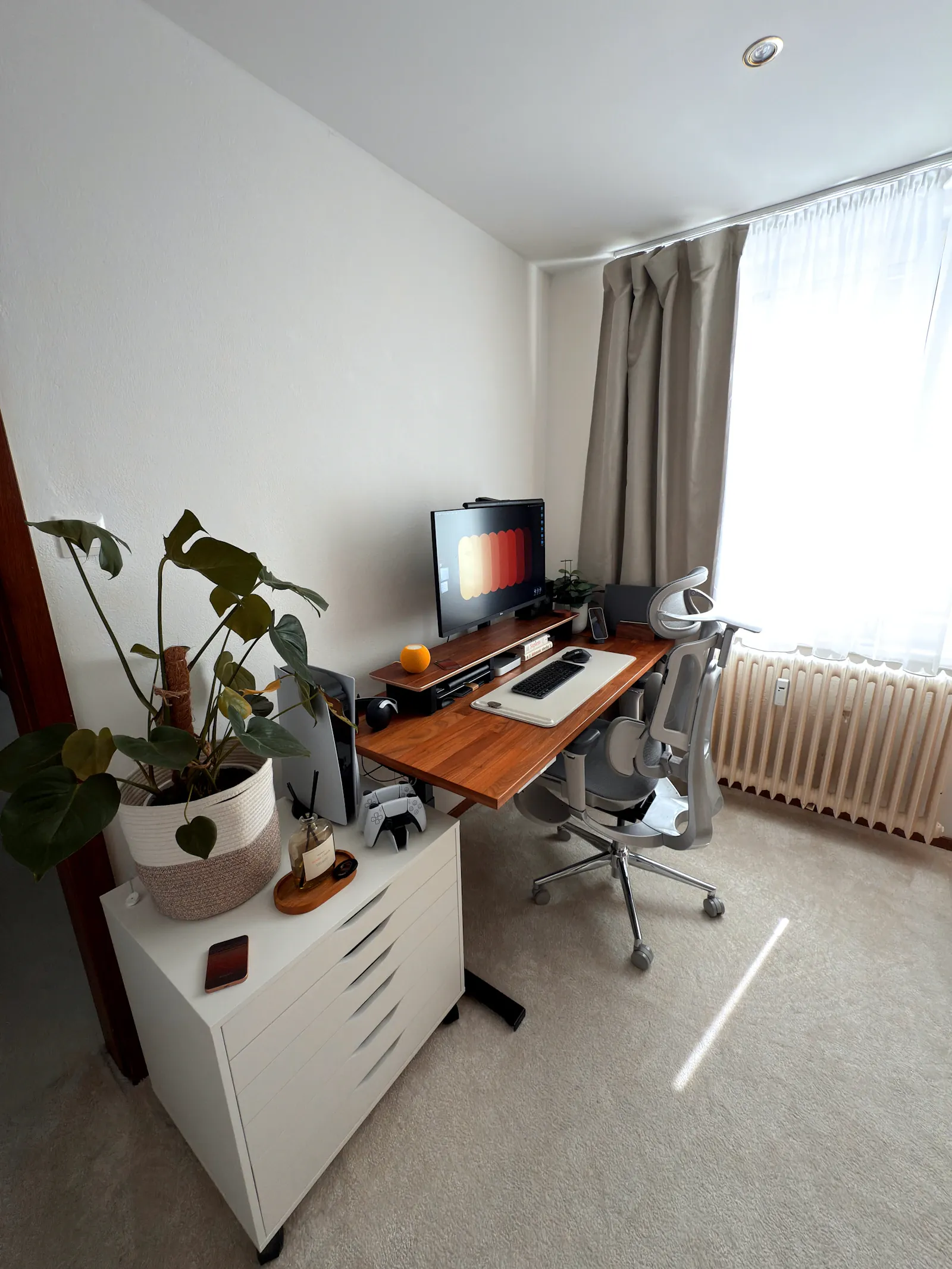 A bright, freshly cleaned small office space with natural light and tidy desk surfaces